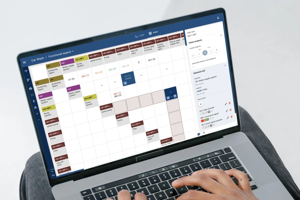 Picture of a laptop. On the screen there is a view from the Systems Engineering cloud software.